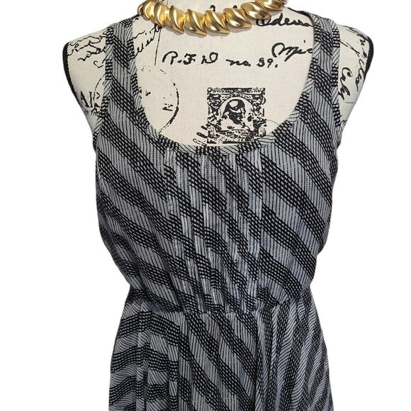 Pleated Front Panel Hankerchief dress With Semi Open Back - Picture 5 of 7
